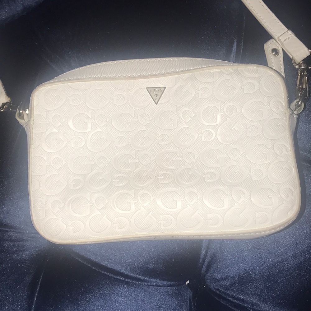 Guess crossbody doubles as a makeup pouch